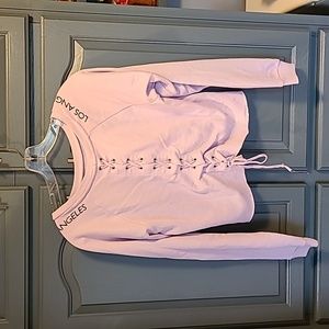 Like new lilac color sweater with x details losangeles written shoulder